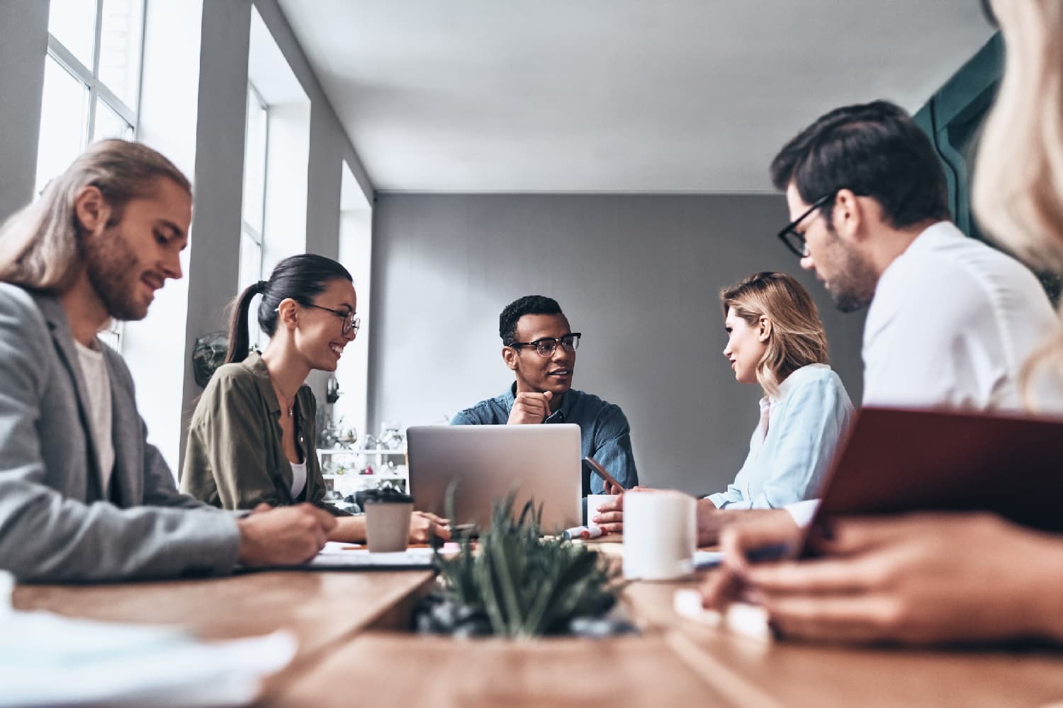 Recruitment professionals collaborating in a modern office